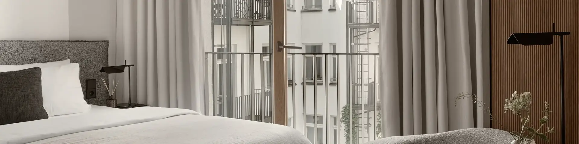 a bedroom with a bed and a chair