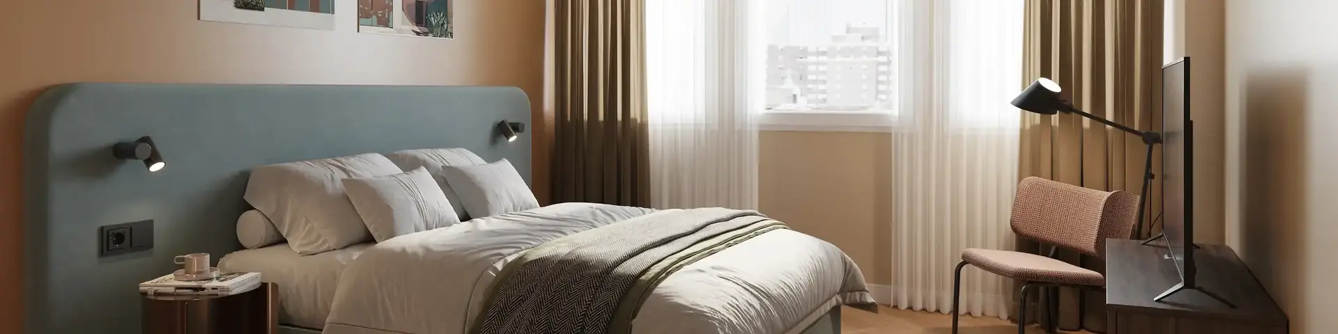 a bedroom with a bed and a desk