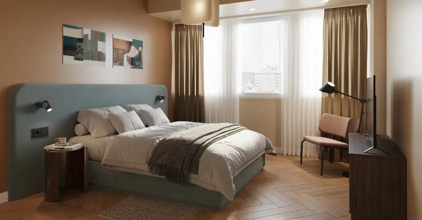 a bedroom with a bed and a desk