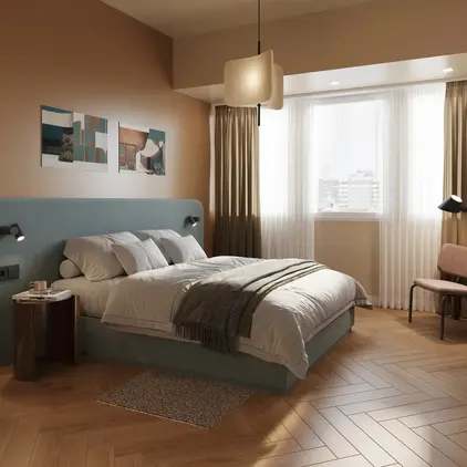 a bedroom with a bed and a desk