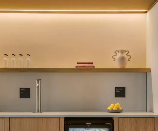 a mini fridge with drinks in it