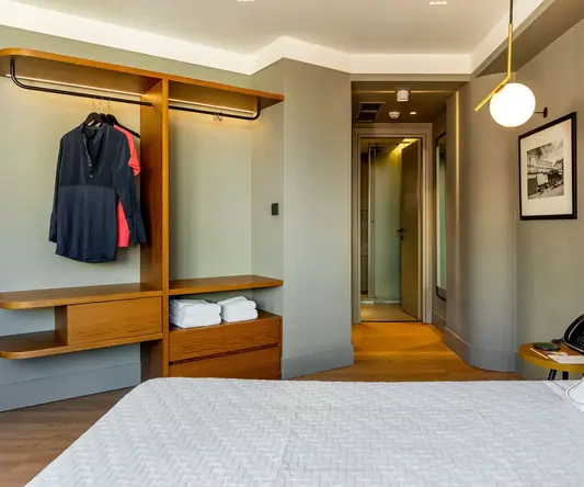 a room with a bed and a closet