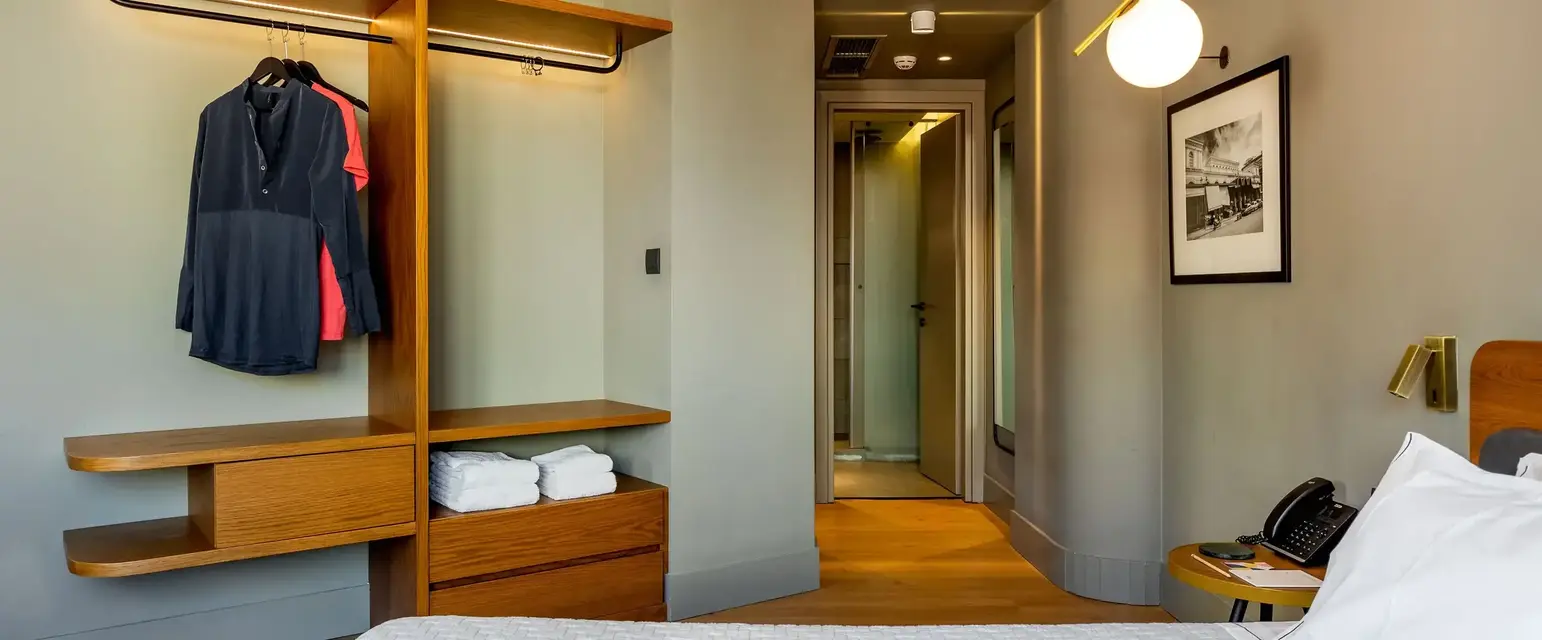 a room with a bed and a closet