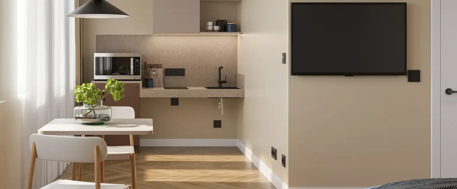 a room with a tv and a bed